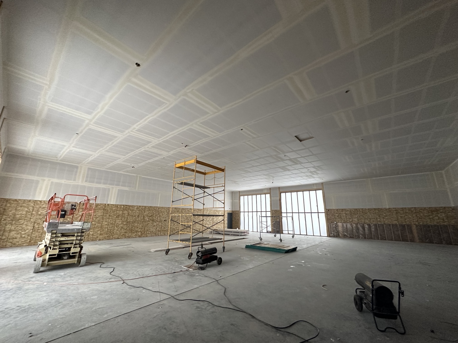 Large commercial drywall ceiling and walls
